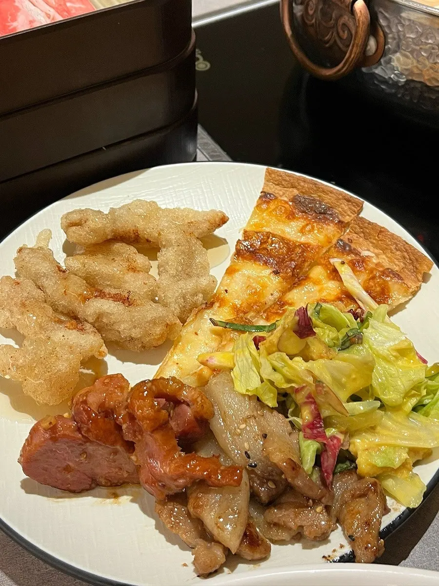 Table spread including food from the self-serve bar