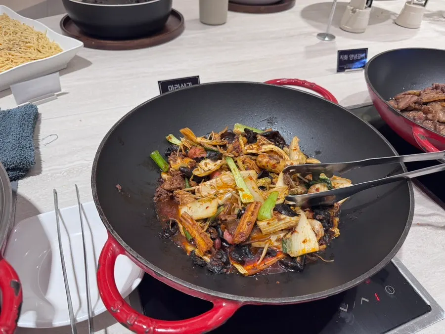 Handmade dishes displayed on the salad bar