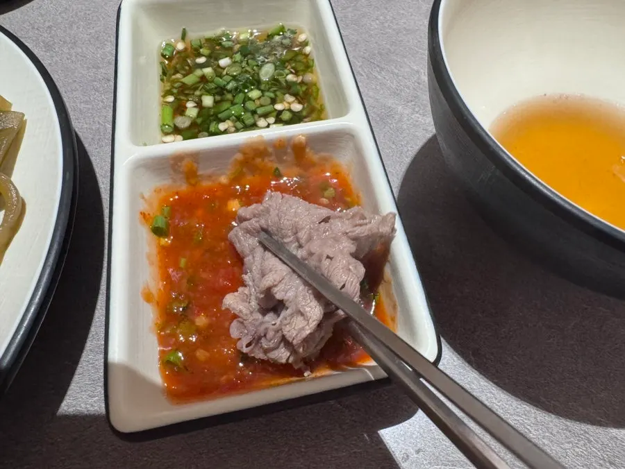 Shabu-shabu meat dipped in sauce