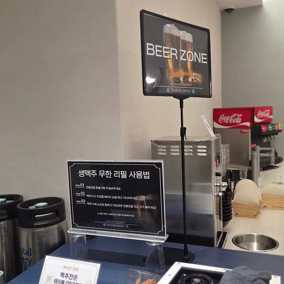 Drinks station with a soda dispenser and soft-serve ice cream machine
