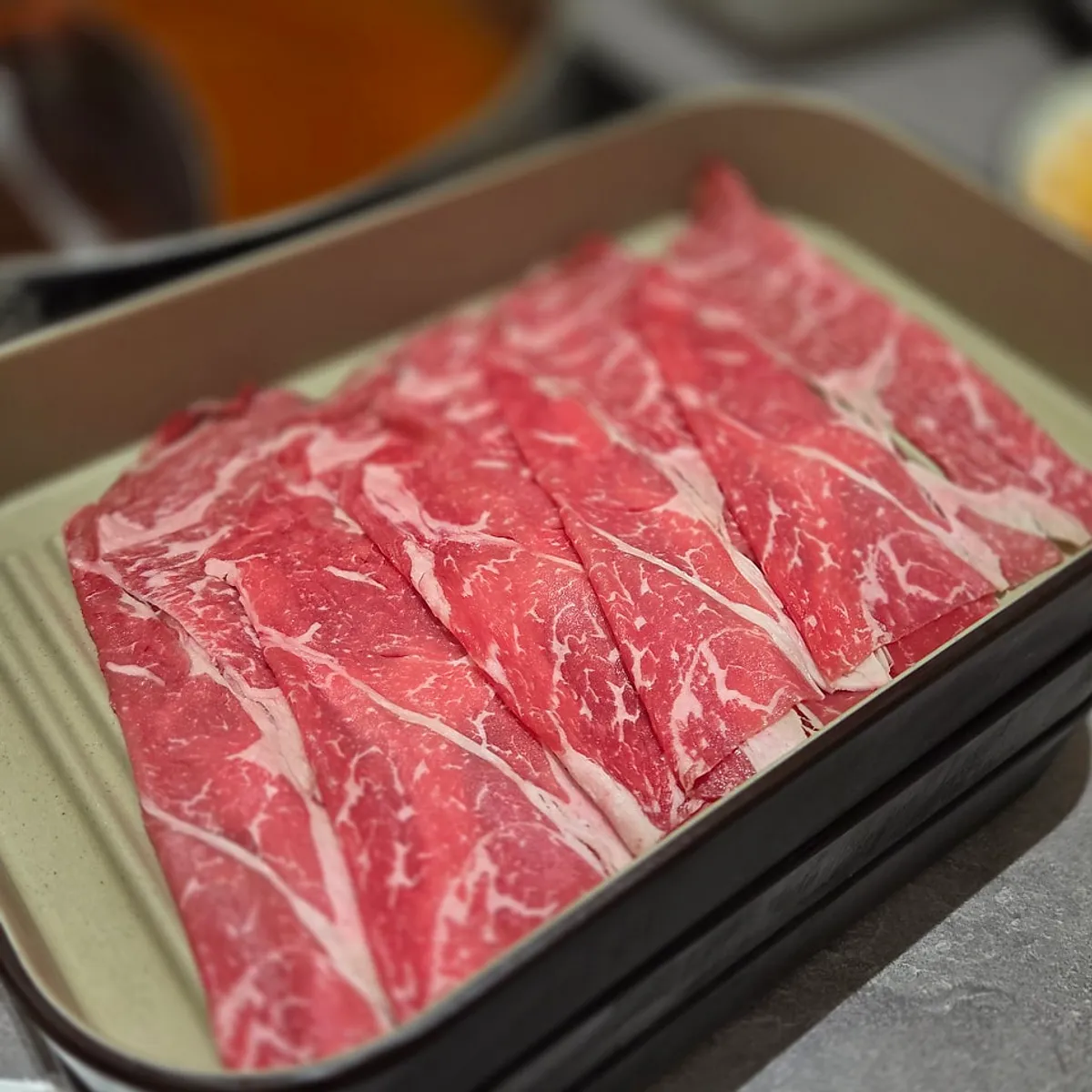 Shabu beef served in neat layers