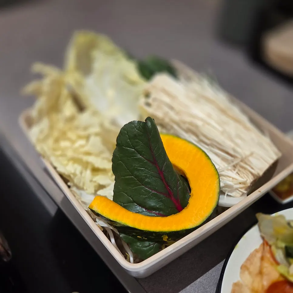 Basic vegetable setup for shabu-shabu on a square tray