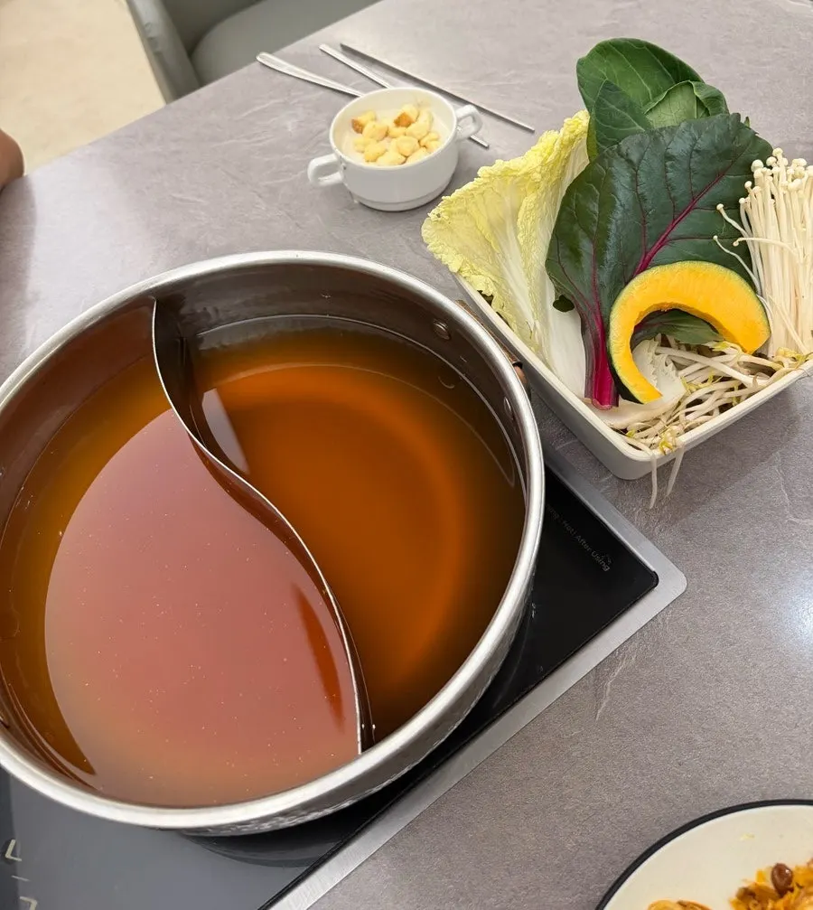 Base broth pot prepared on the table for shabu-shabu