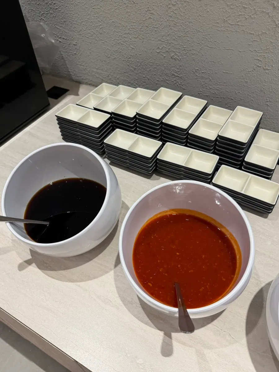 Sauce bar with a wide variety of options at Shabuway