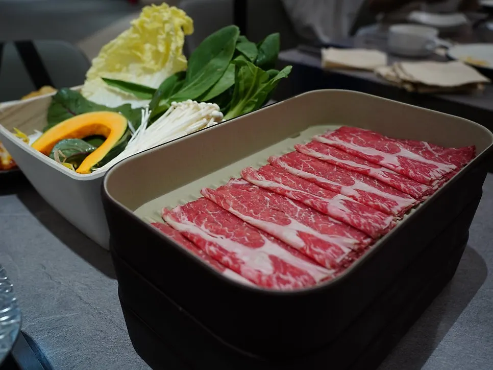 Ladle scooping up shabu-shabu broth