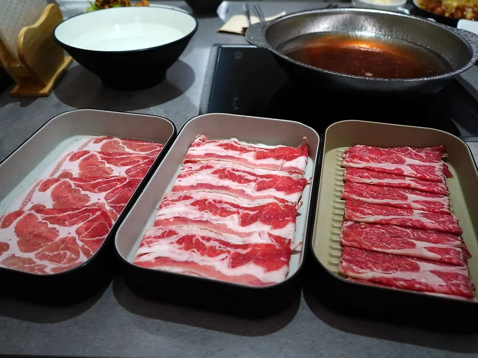 Plate of beef chuck, beef brisket, and pork neck