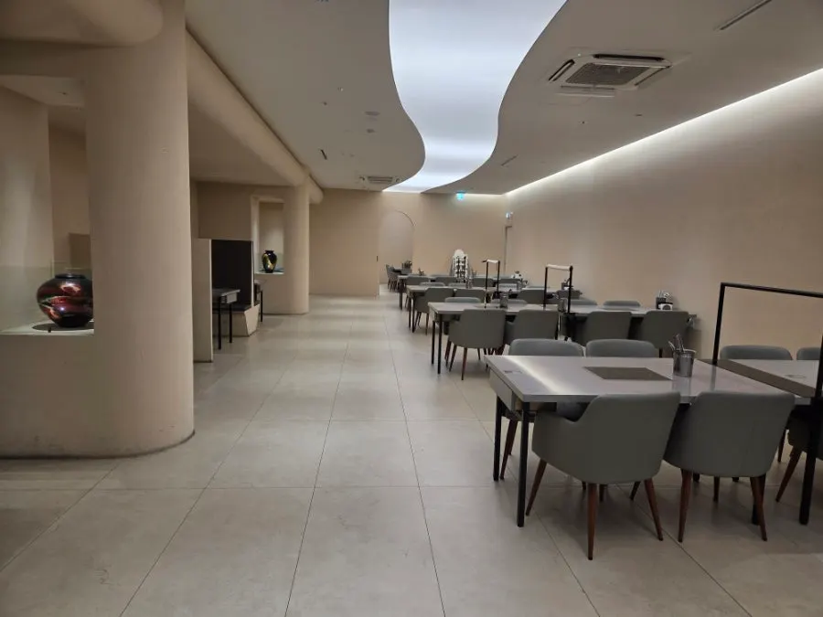 Widely spaced tables and chairs