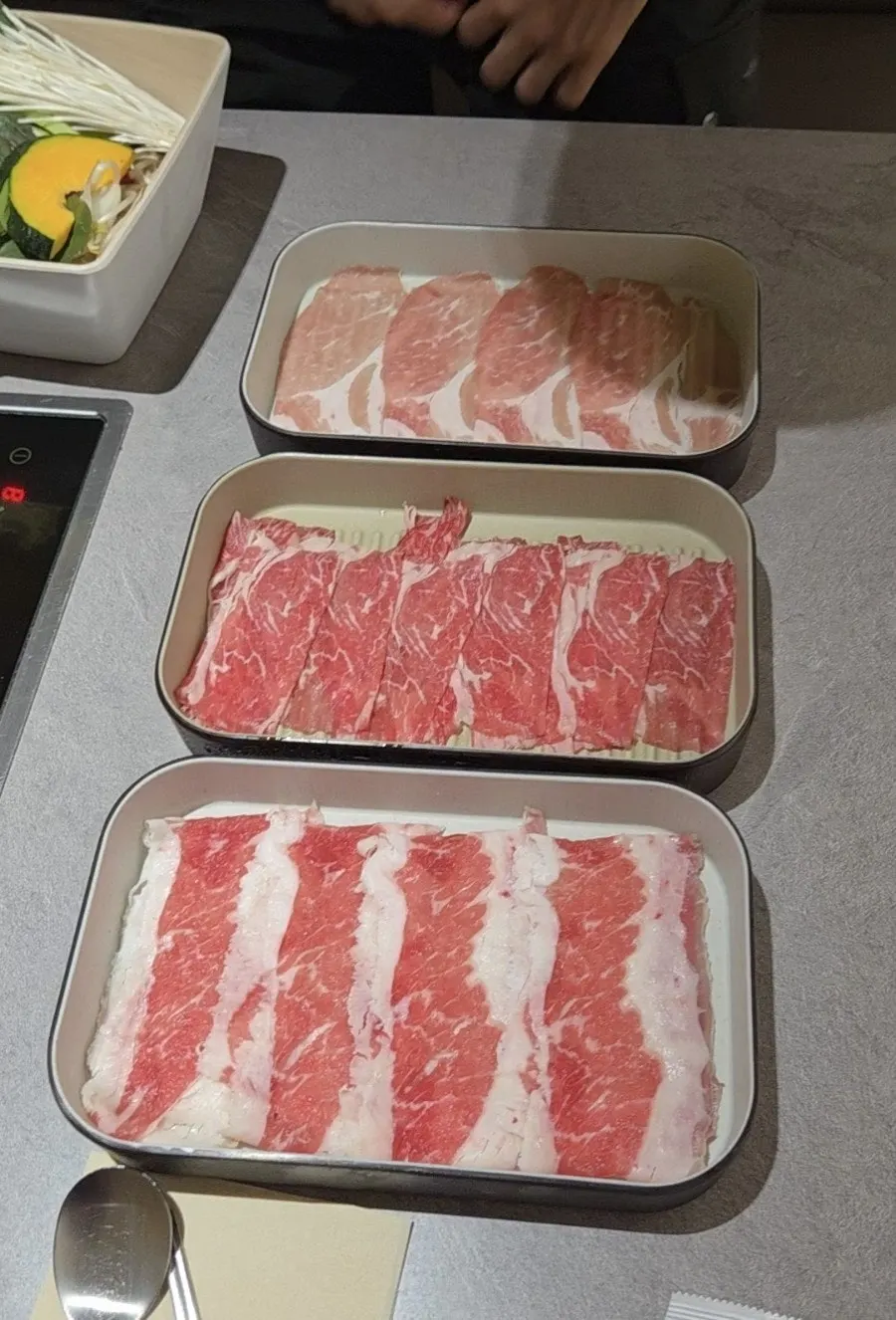 Thin all-you-can-eat shabu-shabu meat brought to the table