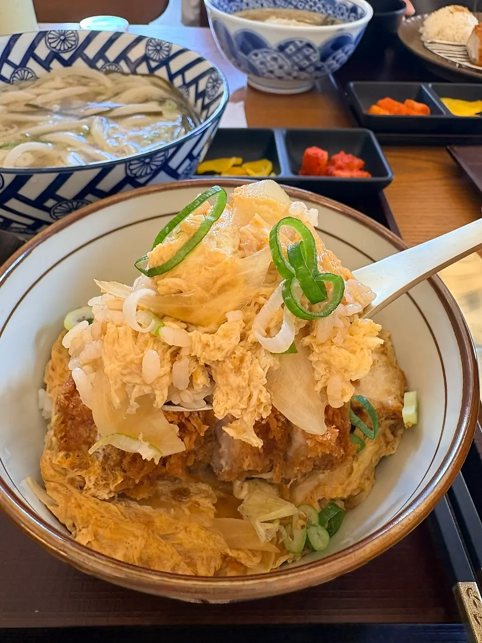 Katsudon topped with thick pork cutlet