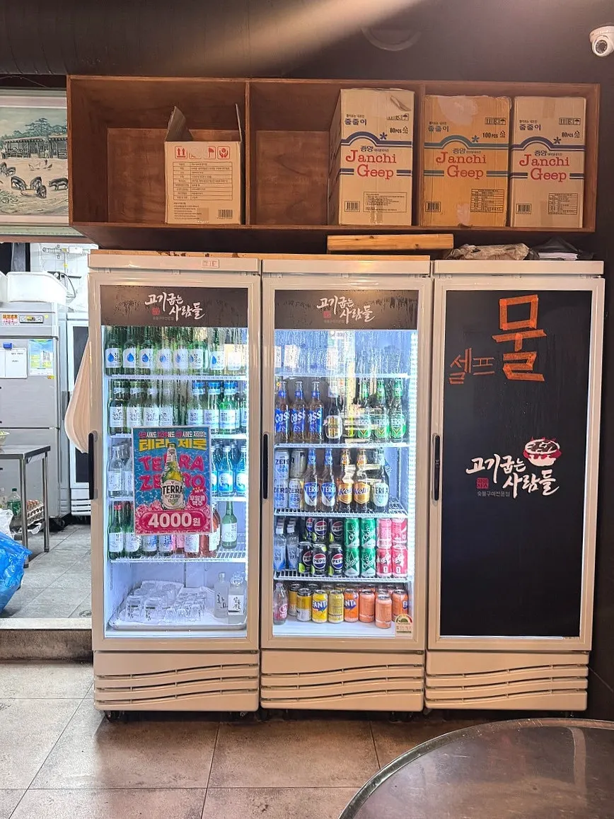 Interior with a sign noting the use of Korean pork