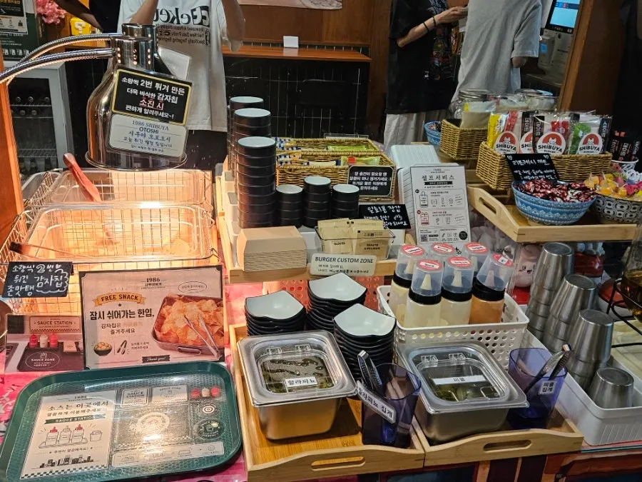 Self-serve bar with chips and sauces
