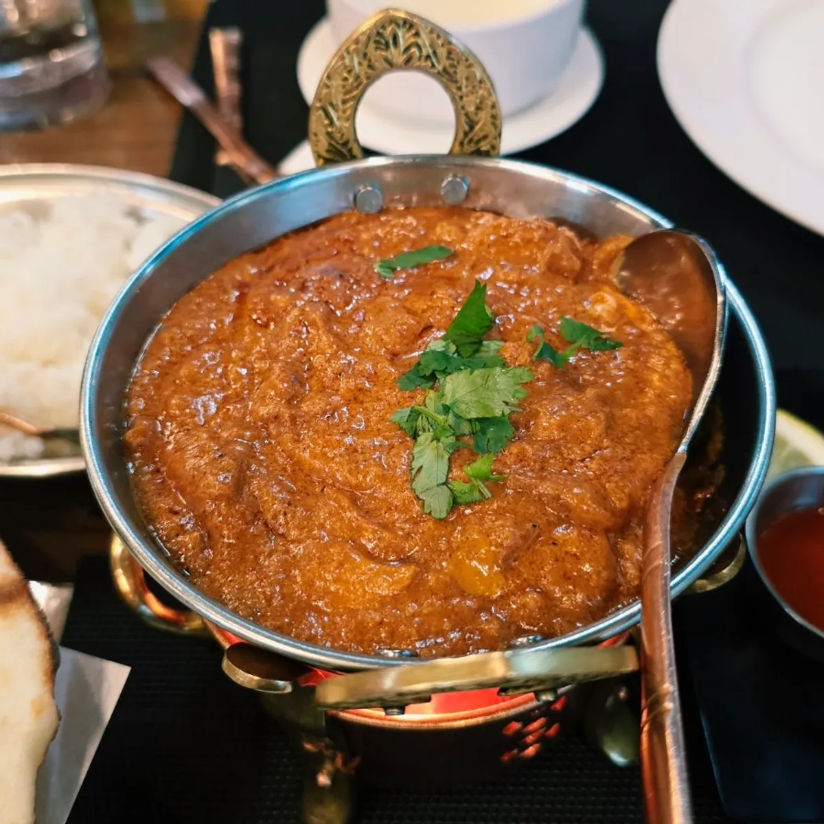 Chicken tikka masala curry with thick pieces of meat