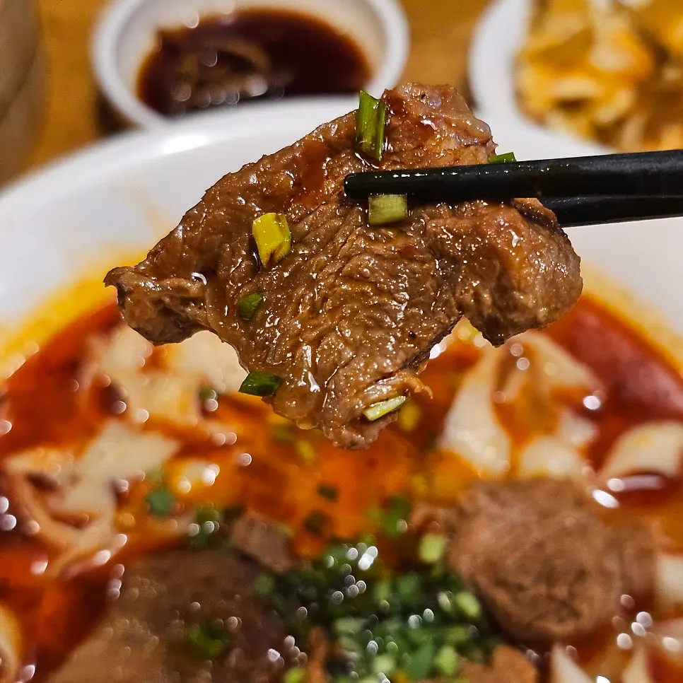 Sinbok Myeongwan's beef knife-cut noodles with red broth