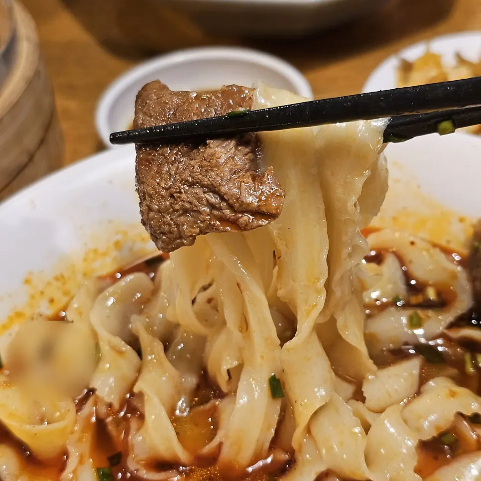 Close-up of hand knife-cut noodle strands