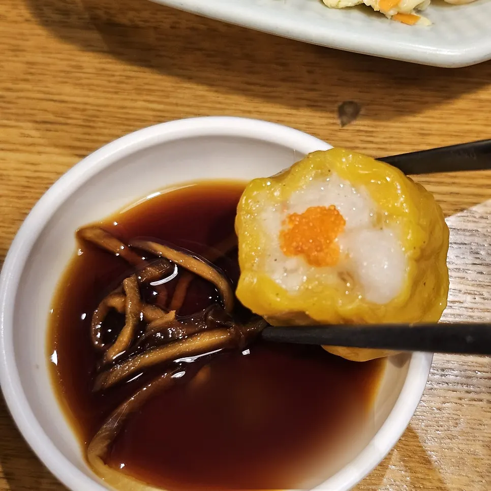 Cross-section of a bitten shaomai dumpling