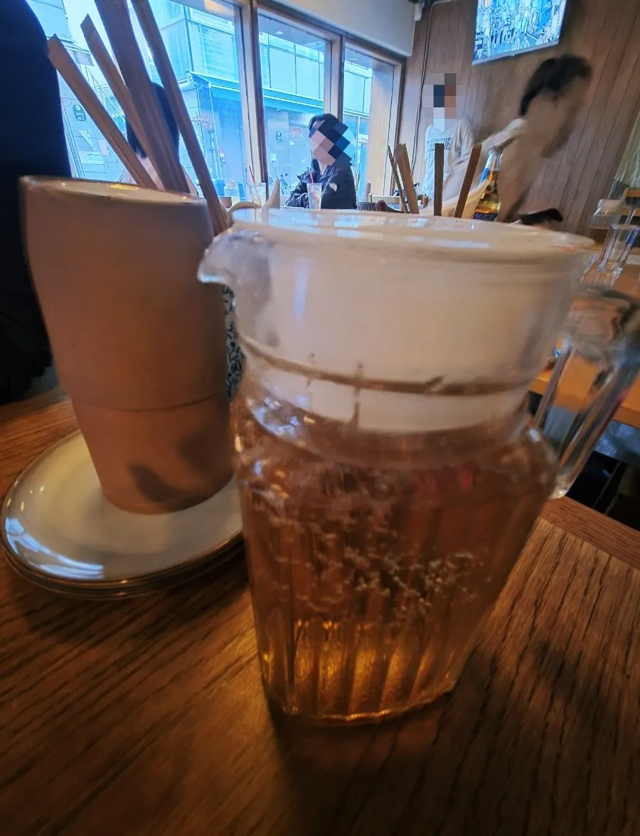 Cold jasmine tea served instead of water