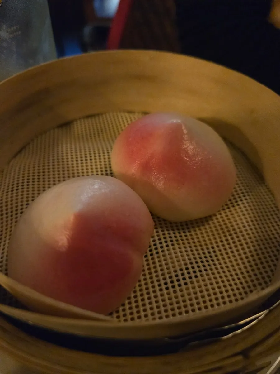 A peach-shaped dessert received from the review event