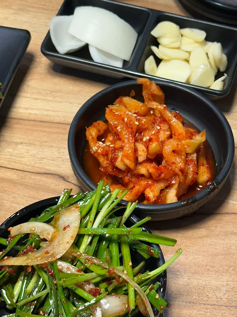 Aged radish kimchi served alongside
