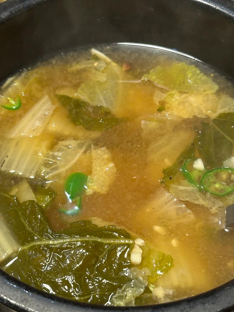 Warm broth served with the jokbal spread
