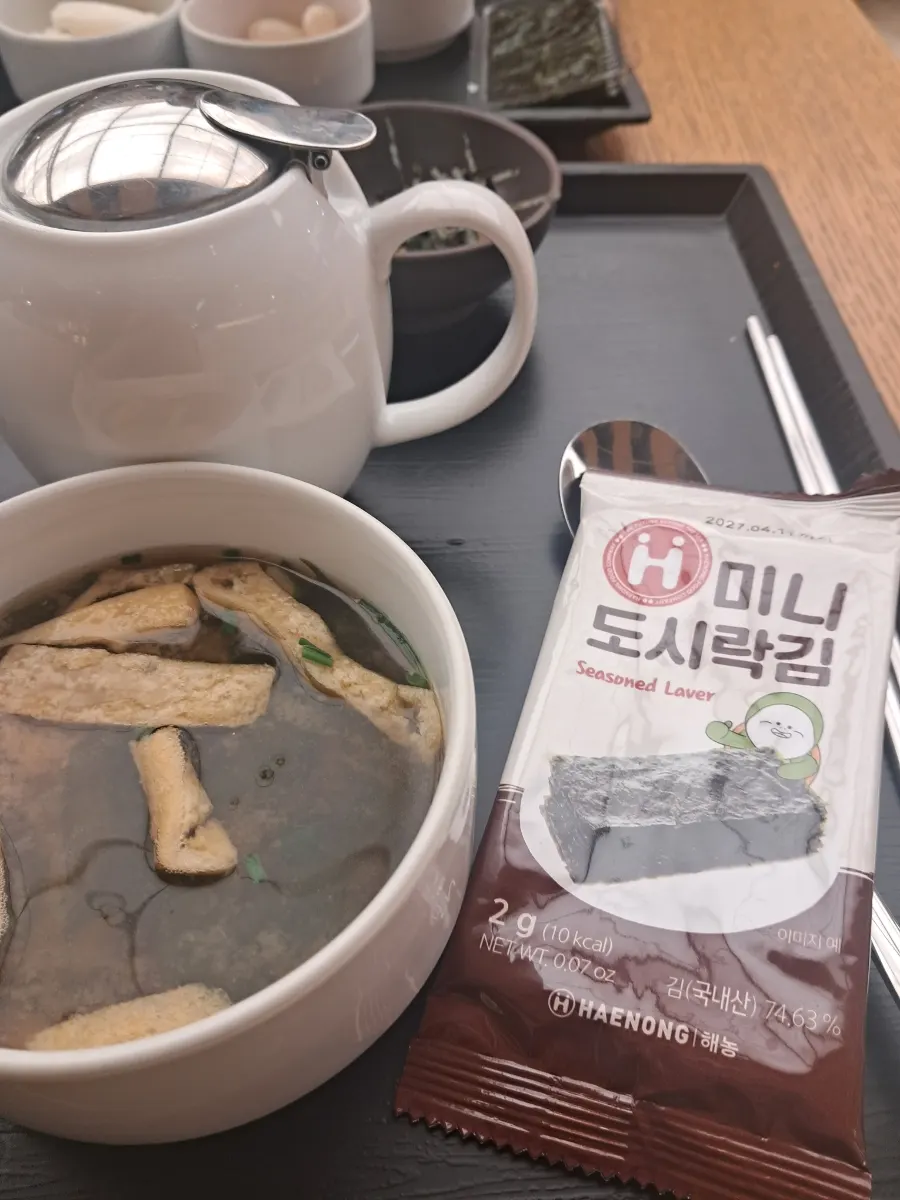 A bite of rice bowl wrapped in mini dried seaweed