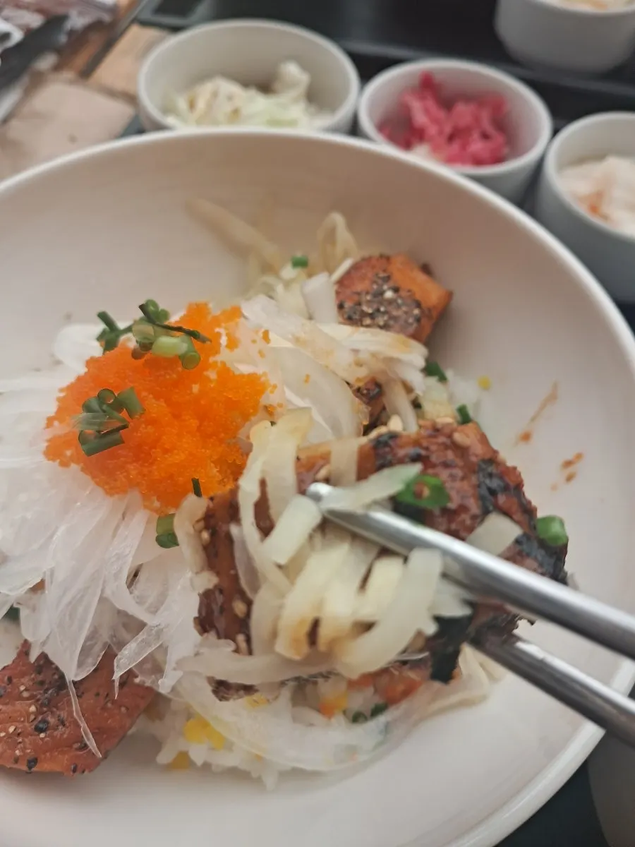 Rice bowl meal served with julienned ginger