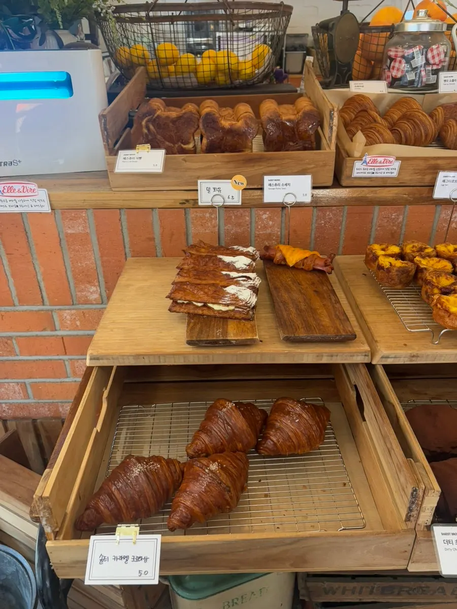 Display case filled with a variety of bakery items