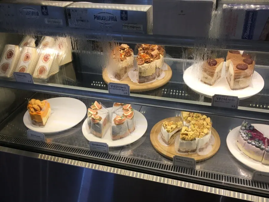 Display case with various desserts
