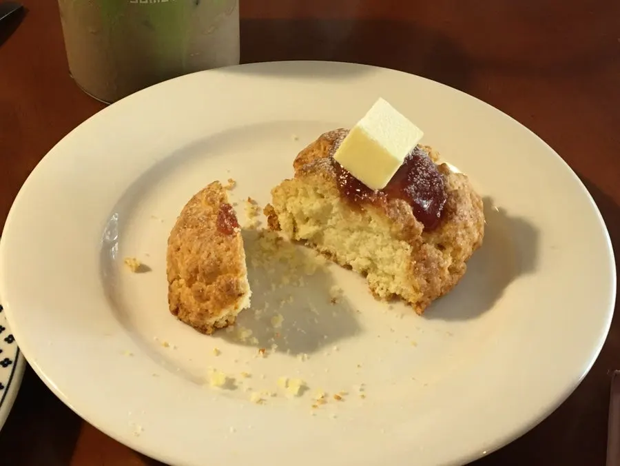 Strawberry butter scone with butter and strawberry jam