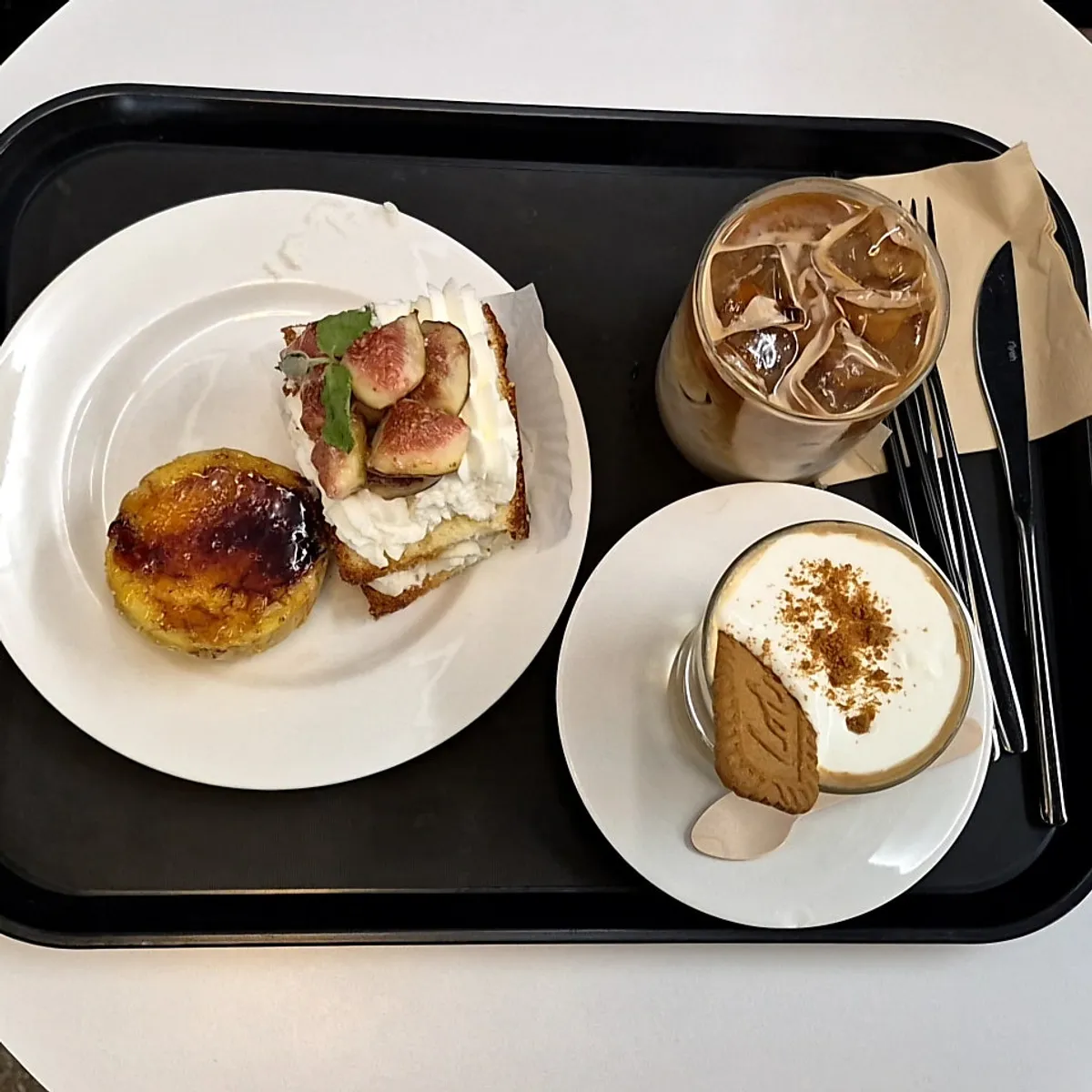 A full spread of drinks and desserts ordered at Upper and Under