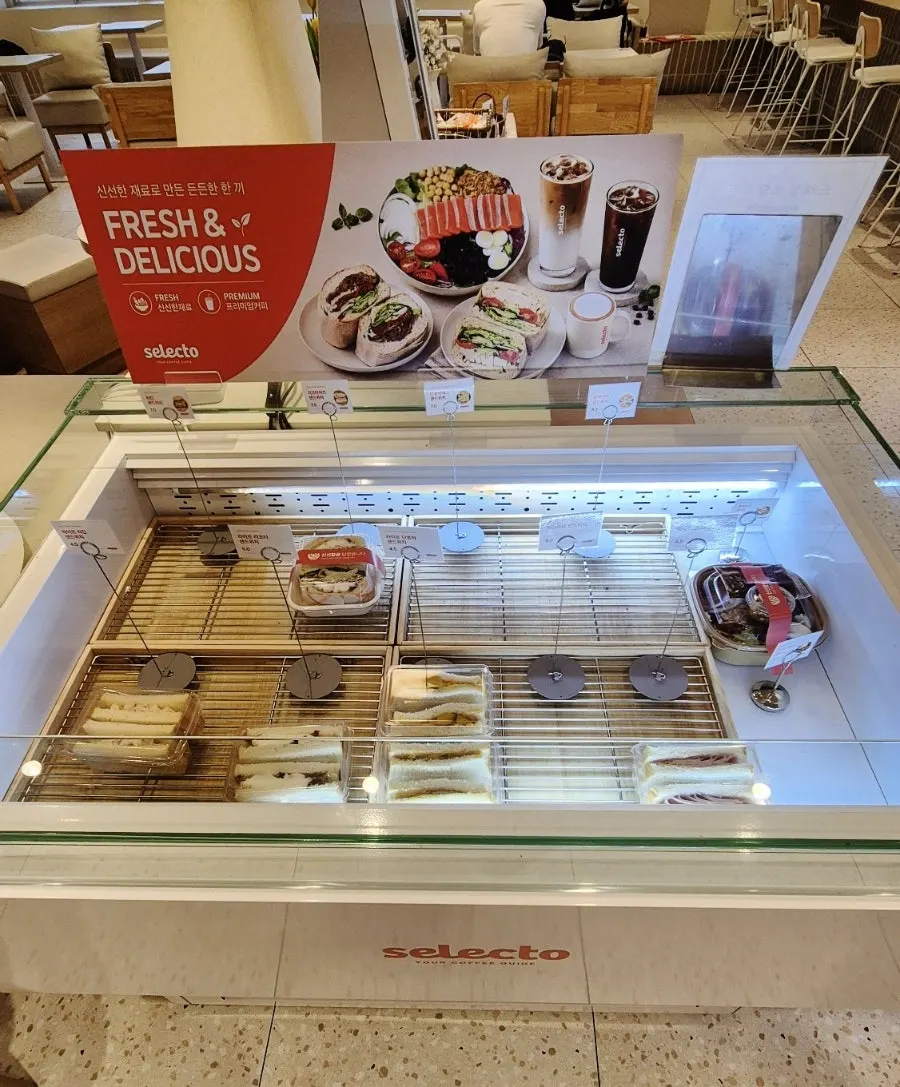 Refrigerated case with sandwiches and salads