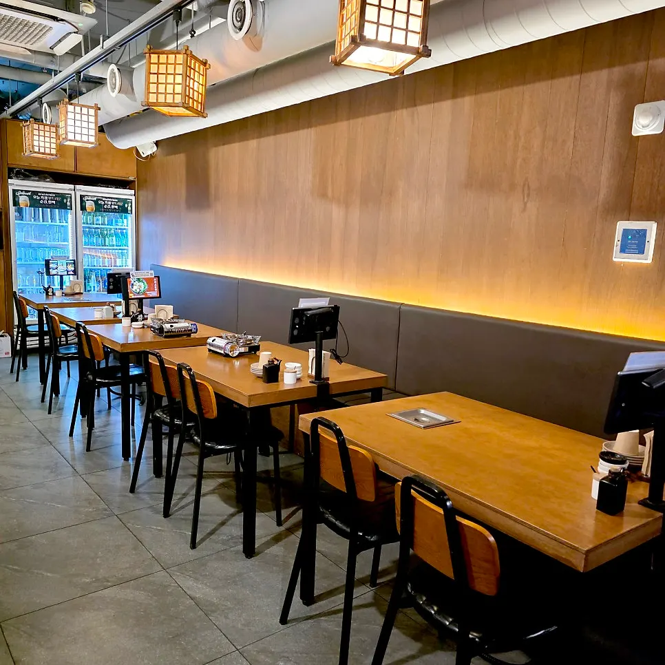 Connected line of tables for group seating