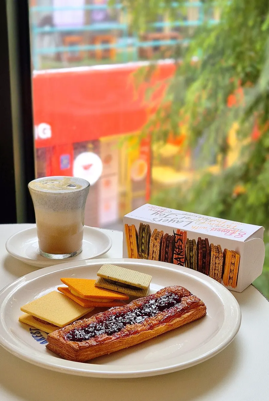 Table setup with Black Sesame Latte, Gangnam Sand, and Raspberry Pie