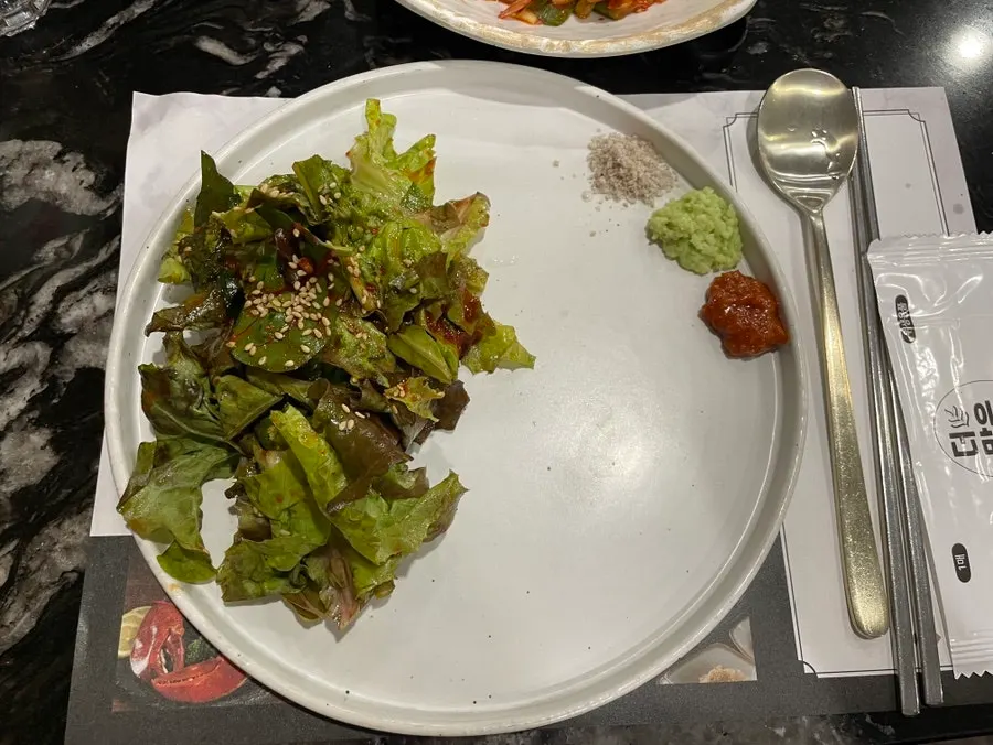 Table set with side dishes and sauces