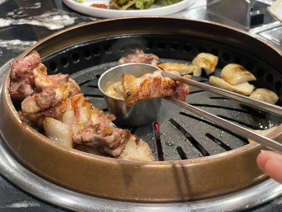 Thick-cut Jeju black pork belly grilled to perfection