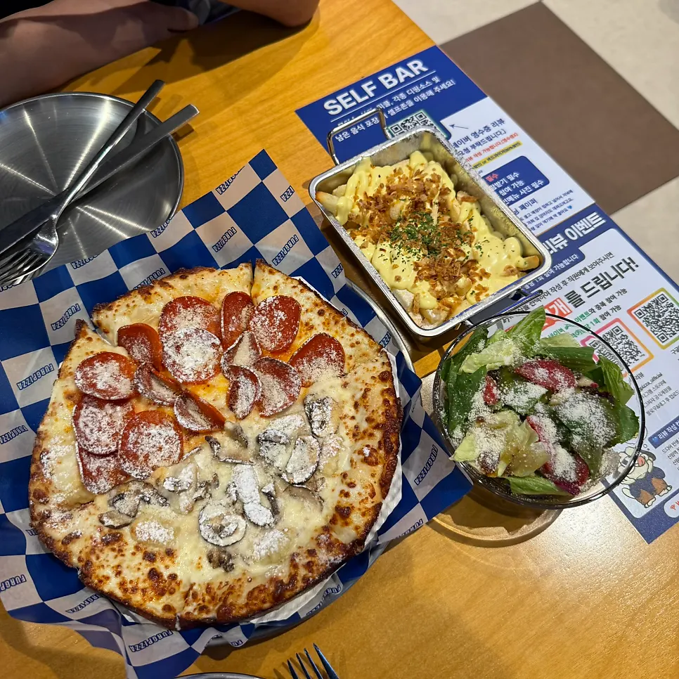 Half-and-half pizza with truffle mushroom gnocchi and hurricane double pepperoni