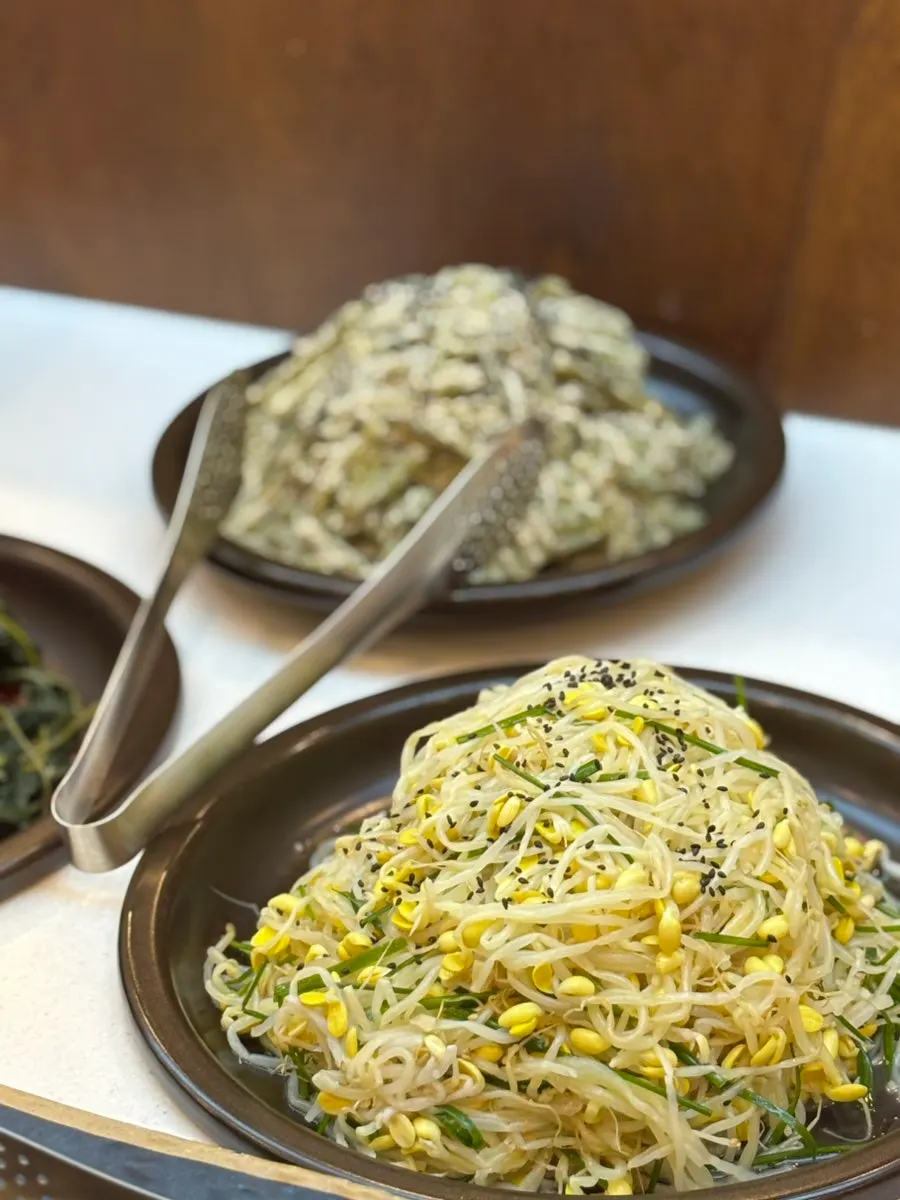 Plates of neat Korean side dishes