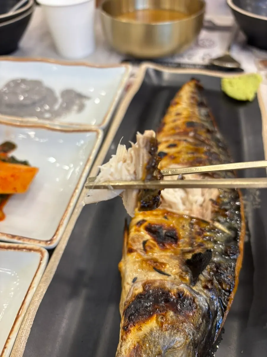 Golden clay-oven grilled mackerel