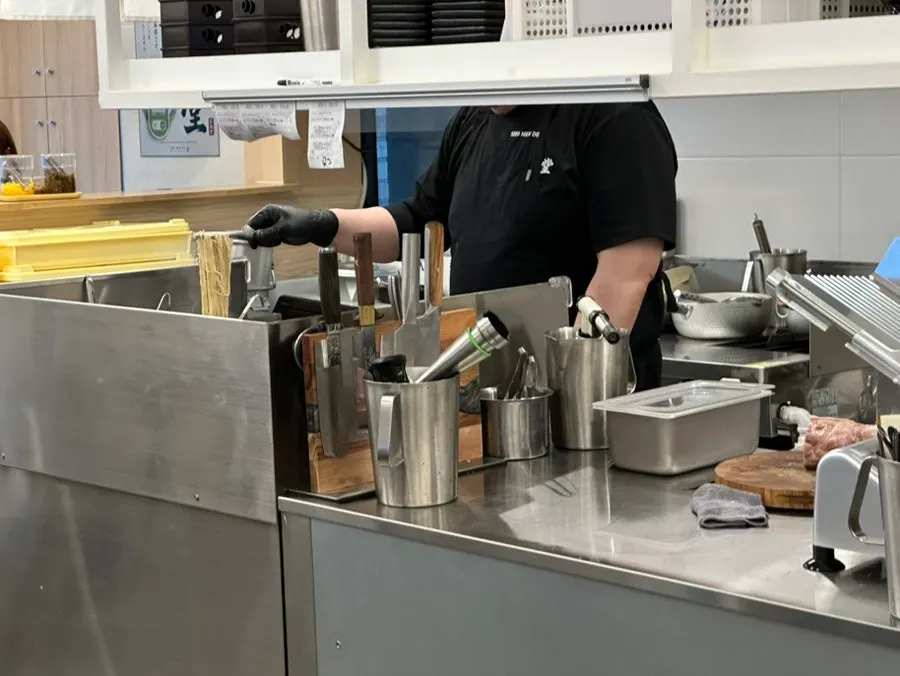Seating facing the Shomendo kitchen