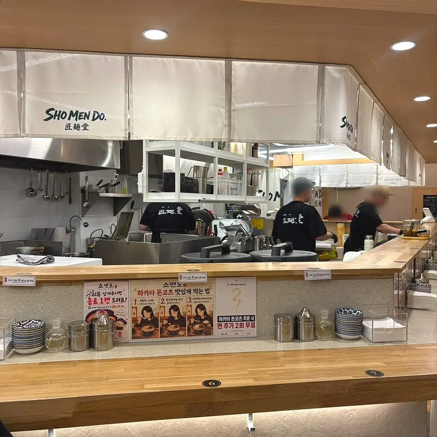 Interior of Shomendo with counter seating and open kitchen