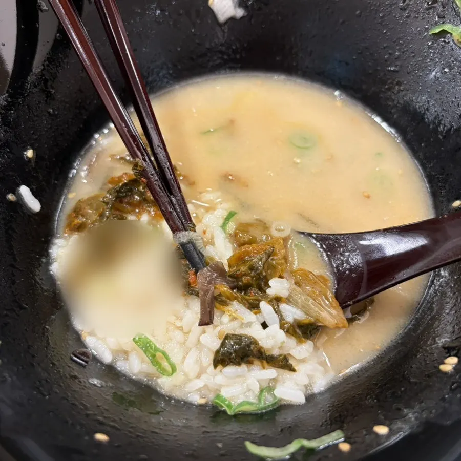 Hakata tonkotsu ramen topped with chashu and a soft-boiled egg