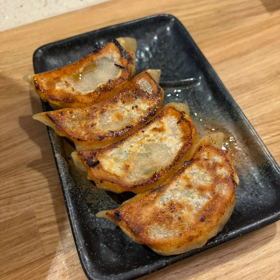 Golden, crispy handmade gyoza dumplings