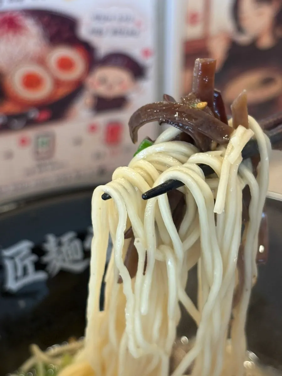 White, thick tonkotsu broth with straight thin noodles
