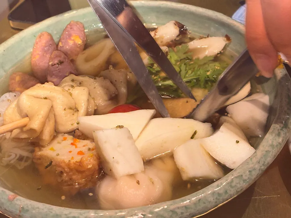 Oden served with shichimi, soy sauce and mustard