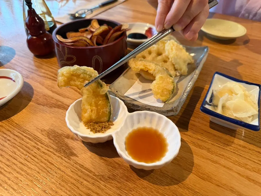 Draft beer and side dishes set on the table at Shunsaikubo Hwamyeong