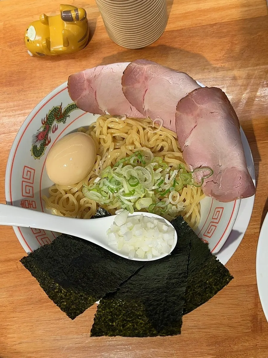 Tsukemen noodles topped with chashu and egg