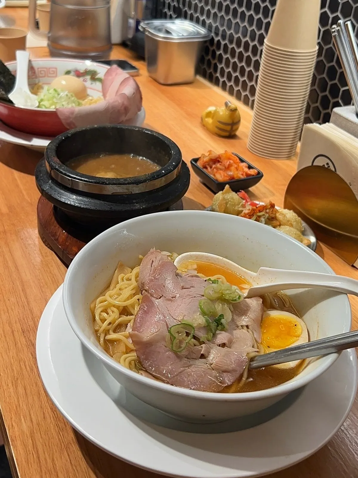 Full spread of ramen and gyoza at Mentsuru City Hall Branch