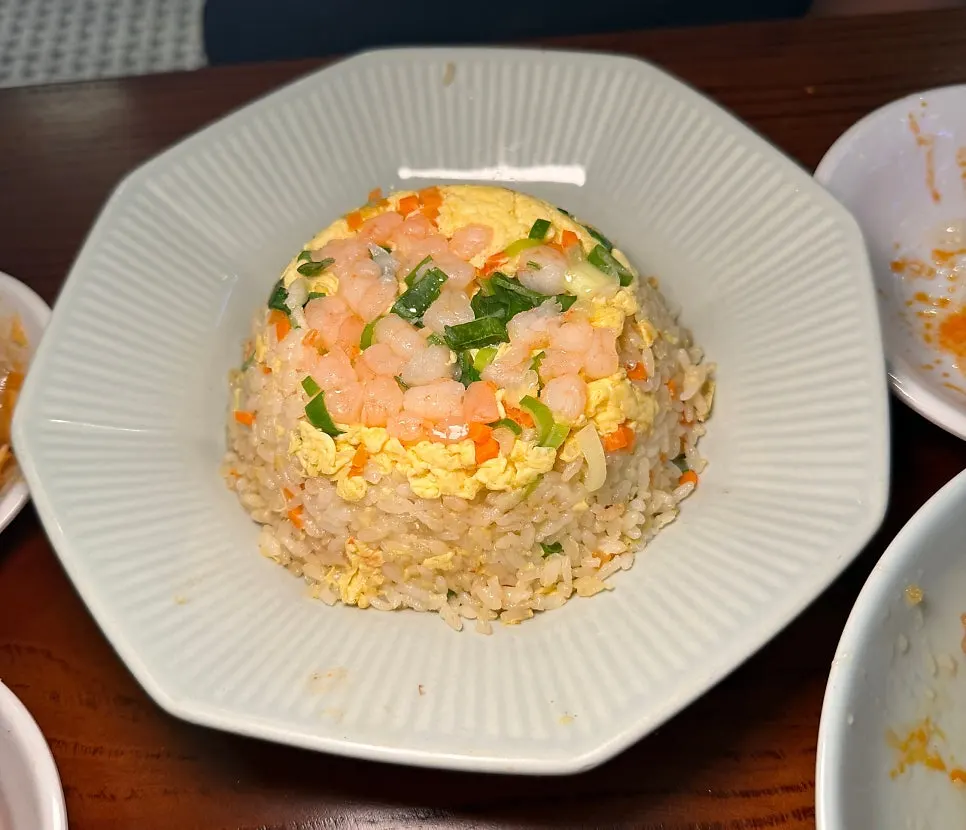 Cheonghwawon shrimp fried rice topped with shrimp