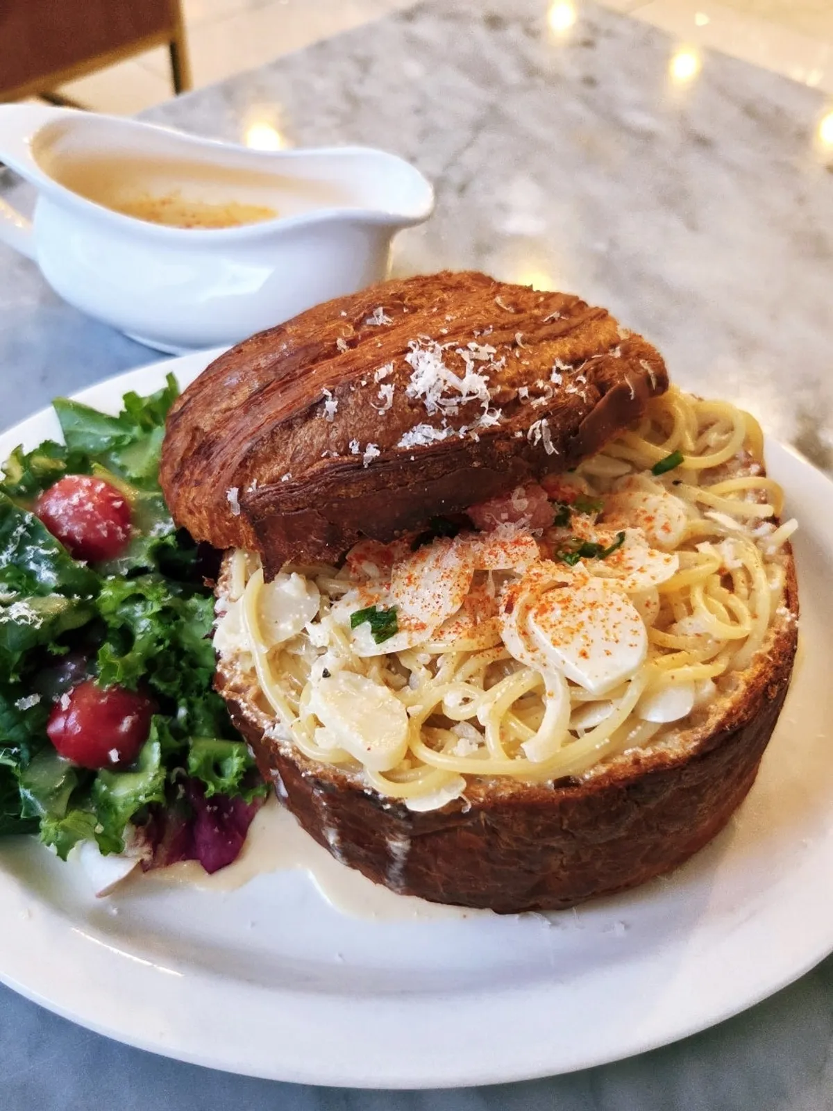 Myeongnan cream pasta served in Mont Blanc bread