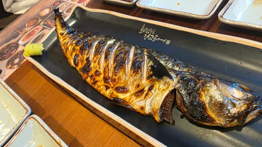 Grilled mackerel and Korean meal spread
