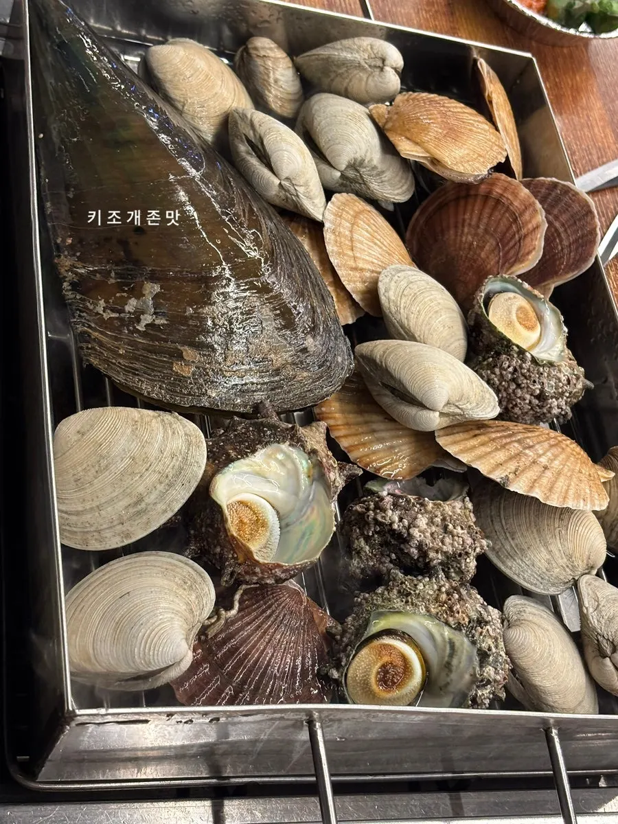 A plate of plump geoduck